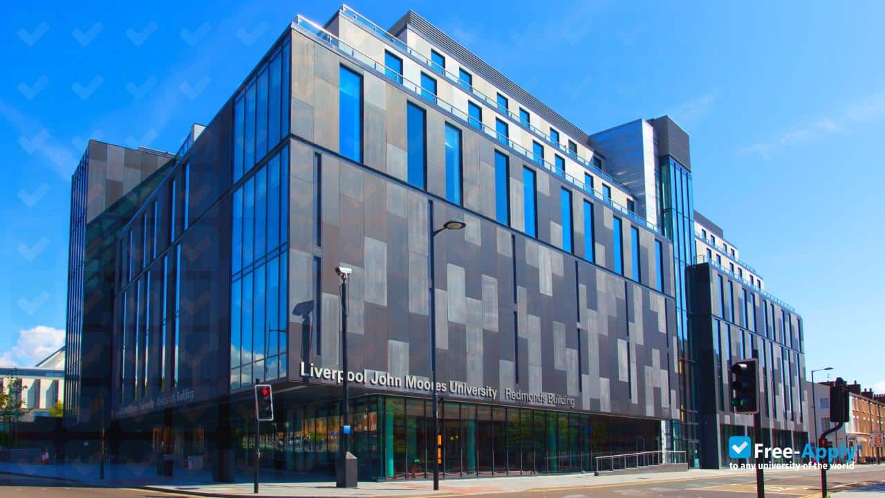 A modern glass-fronted building of Liverpool John Moores University.