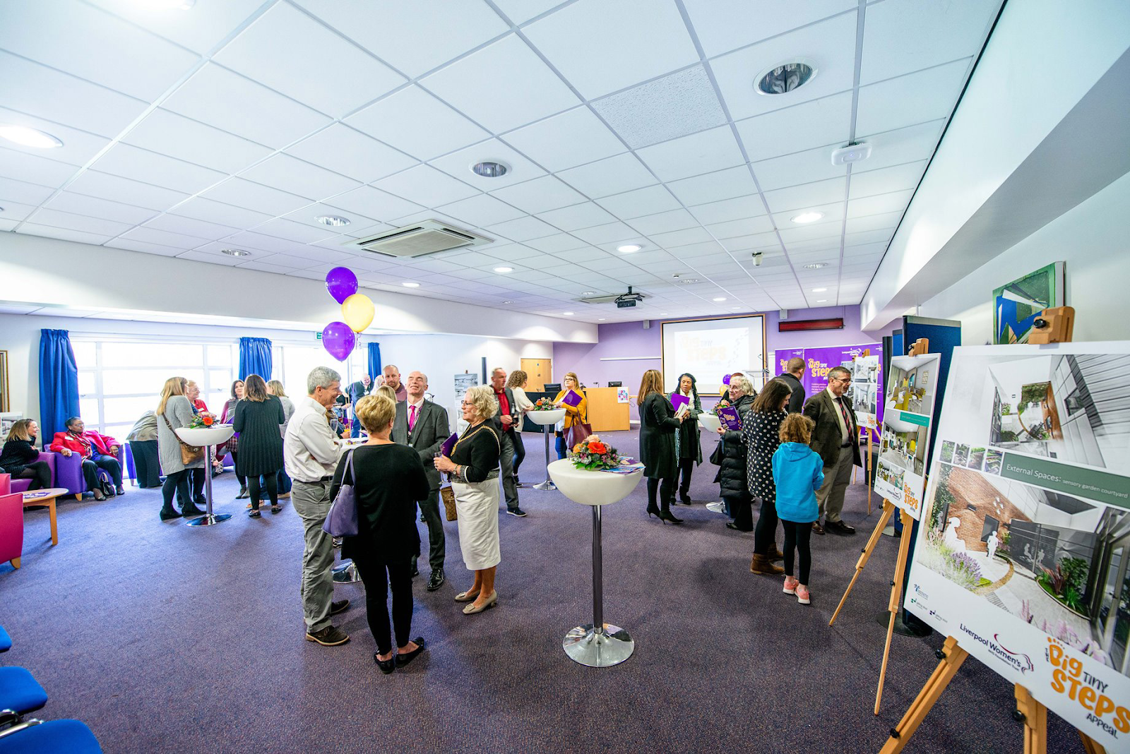 The modern interior of The Blair Bell Education Centre, showing a lecture hall or conference room.